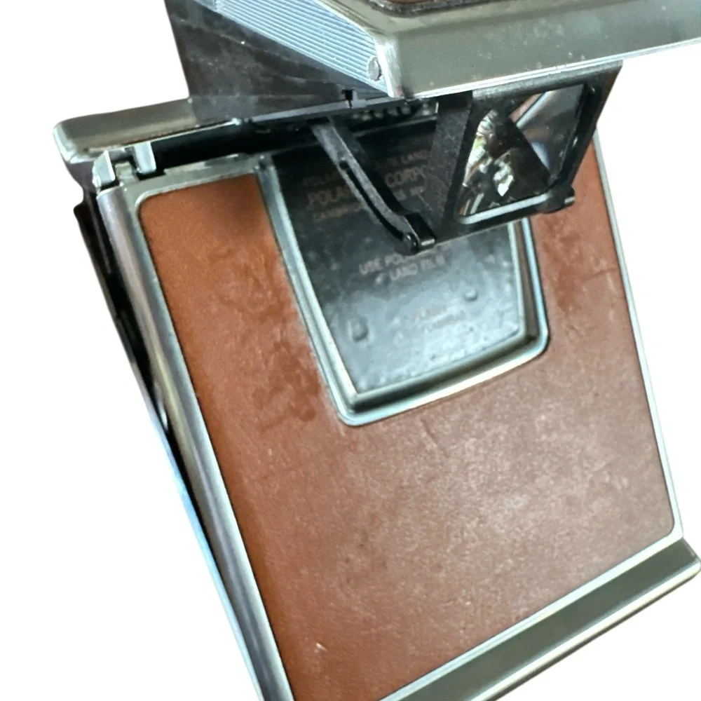 Polaroid SX-70 Land Camera Silver and Brown Film Camera with Classic Design